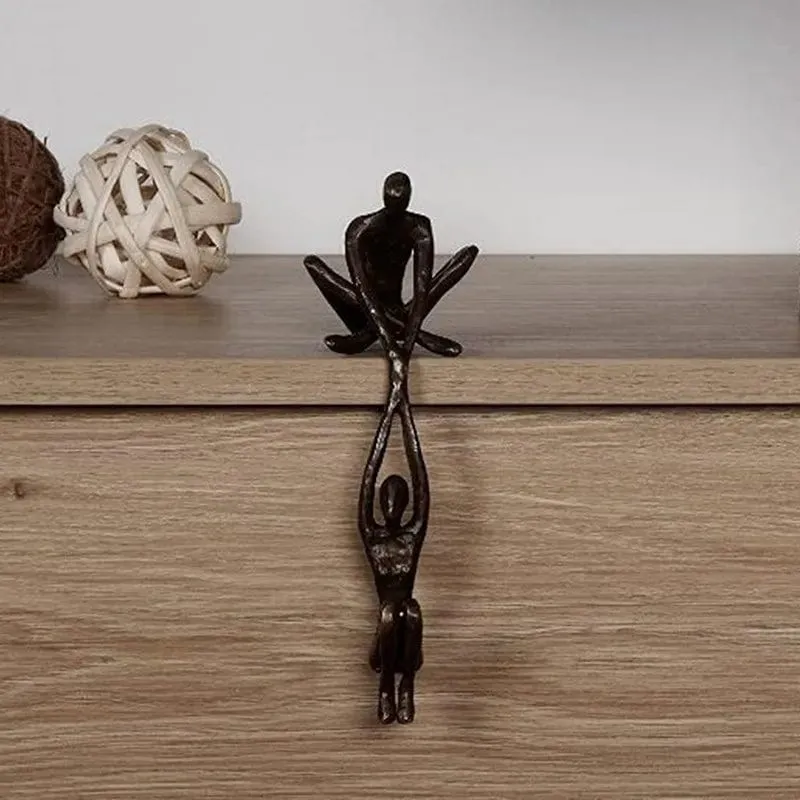 Enduring Love: Man Lifting Woman Figurine Sculpture for Creative Desktop Decor and Artistic Home Ornament
